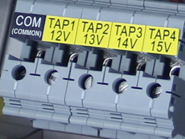 with four voltage taps 12V thru 15V to compensate for voltage loss. 